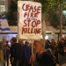 Israeli left-wing activists demonstrate against the Israeli government outside the Prime Minister’s residence in Jerusalem on Sunday