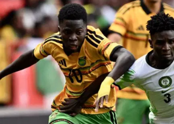 Nigerian player tango with Jamaican striker to win the Unity Cup at The Valley in London