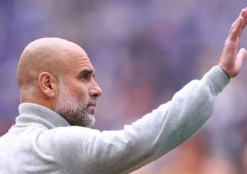 Pep Guardiola bids farewell to players and fans of Manchester City at the Etihad on Sunday