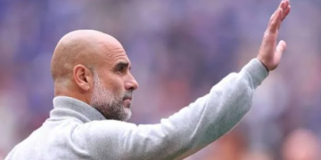 Pep Guardiola bids farewell to players and fans of Manchester City at the Etihad on Sunday