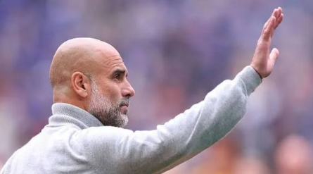 Pep Guardiola bids farewell to players and fans of Manchester City at the Etihad on Sunday