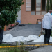 Kenyan police detectives stand next to the bodies of victims of a deadly fire at the Utumishi Girls Academy in Gilgil, north of the capital Nairobi on May 28, 2026. Photo: AFP
