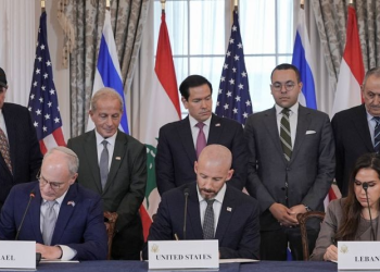 US Secretary of State Marco Rubio looks on as State Department Counselor Daniel Holler, Israel's Ambassador to the U.S. Yechiel Leiter and Lebanon's Ambassador to the U.S. Nada Hamadeh sign a framework agreement between Israel and Lebanon, at the State Department in Washington, DC