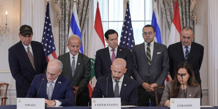 US Secretary of State Marco Rubio looks on as State Department Counselor Daniel Holler, Israel's Ambassador to the U.S. Yechiel Leiter and Lebanon's Ambassador to the U.S. Nada Hamadeh sign a framework agreement between Israel and Lebanon, at the State Department in Washington, DC