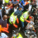 Sanwo-Olu clearing refuse during the monthly environmental sanitation exercise on Saturday