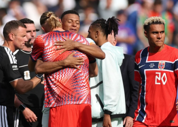 Norway's forward #09 Erling Braut Haaland hugs France's forward #10 Kylian Mbappe at the end of the 2026 World Cup Group I football match between Norway and France at the Boston Stadium in Foxborough on June 26, 2026
