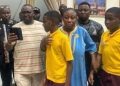 Chief Adebayo Adelabu receiving the kidnap victims ine Ibadan after their rescue.e