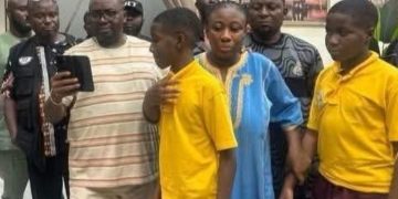 Chief Adebayo Adelabu receiving the kidnap victims ine Ibadan after their rescue.e