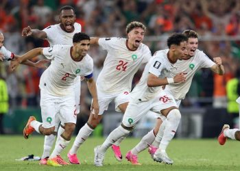 Moroccan players in jubilation after the penalties were decided.