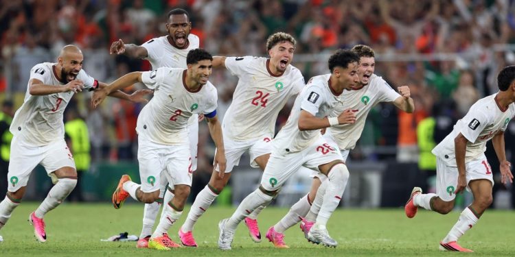 Moroccan players in jubilation after the penalties were decided.