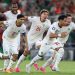 Moroccan players in jubilation after the penalties were decided.