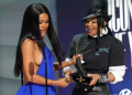 Teyana Taylor accepts the Icon of the Year award from Janet Jackson onstage during the 2026 BET Awards at Peacock Theater in Los Angeles, California