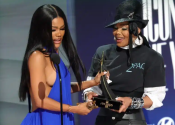 Teyana Taylor accepts the Icon of the Year award from Janet Jackson onstage during the 2026 BET Awards at Peacock Theater in Los Angeles, California