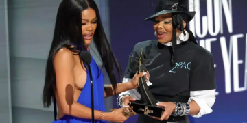 Teyana Taylor accepts the Icon of the Year award from Janet Jackson onstage during the 2026 BET Awards at Peacock Theater in Los Angeles, California