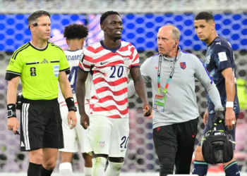 US forward #20 Folarin Balogun leaves the pitch during the 2026 World Cup Group D football match between USA and Paraguay at the Los Angeles Stadium in Inglewood