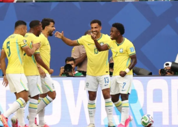 Brazil players celebrating victory over Scotland