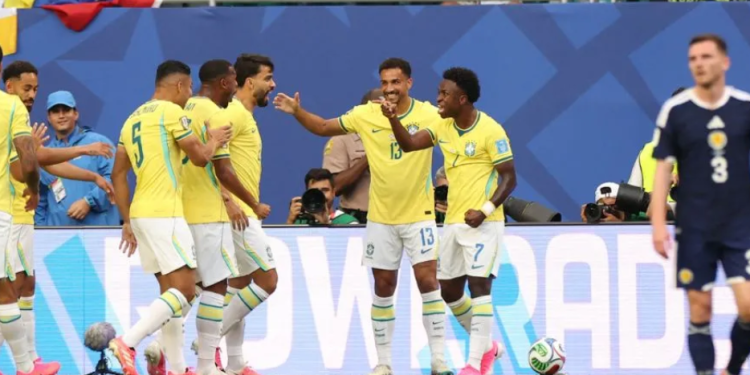 Brazil players celebrating victory over Scotland