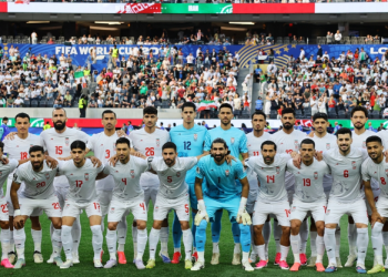 Iran players pose for a team group photograph before their 2026 FIFA World Cup opening game against New Zealand, which ended in a 2-2 draw