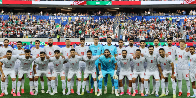 Iran players pose for a team group photograph before their 2026 FIFA World Cup opening game against New Zealand, which ended in a 2-2 draw