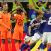 Japan celebrate their late equalizer against Netherlands scored by Daichi Kamada