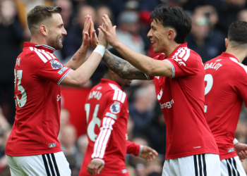 Manchester United's English defender, 23 Luke Shaw, L, celebrates with Manchester United's Argentinian defender, 06 Lisandro Martinez, R, after scoring the opening goal during the English Premier League football match between Manchester United and Nottingham Forest at Old Trafford in Manchester, northwest England, on May 17, 2026