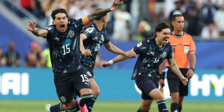 Paraguay players celebrating victory over Germany