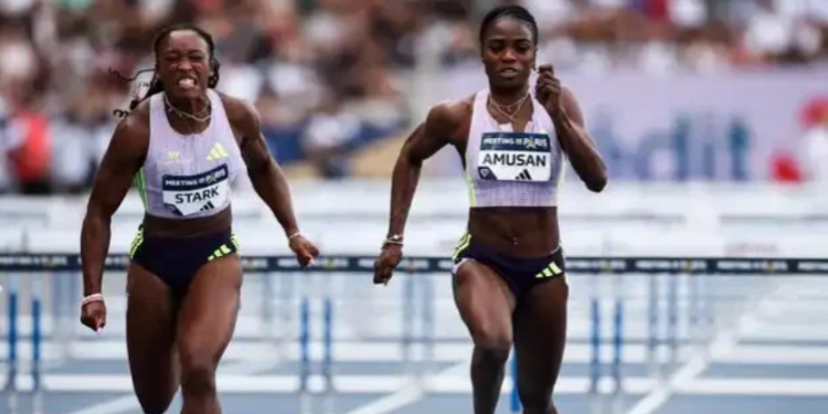 Tobi Amusan (R) at the Paris Diamond League
