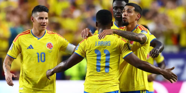 Colombia's Jhon Arias celebrates scoring their first goal with Daniel Munoz, Davinson Sanchez, James Rodriguez