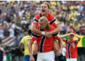 Norway’s forward Erling Haaland celebrates scoring his team’s second goal with teammate midfielder Andreas Schjelderup during the 2026 World Cup round of 16 football match between Brazil and Norway at the New York/New Jersey Stadium in East Rutherford