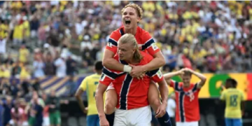 Norway’s forward Erling Haaland celebrates scoring his team’s second goal with teammate midfielder Andreas Schjelderup during the 2026 World Cup round of 16 football match between Brazil and Norway at the New York/New Jersey Stadium in East Rutherford