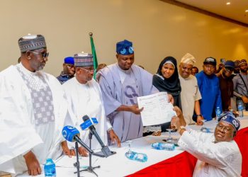 National Chairman of the APC, Prof. Nentawe Yilwatda recieves the formal submission of the duly completed nomination forms of Tinubu and Shettima