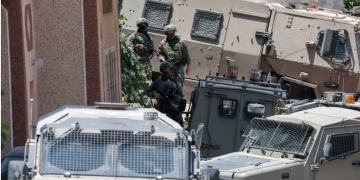 Israeli forces conducting a military raid in the occupied West Bank village of Tal, following the deadly shootout that left four Palestinians and two Israeli soldiers dead
