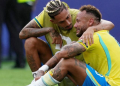 Brazil's Neymar is consoled by teammate Raphinha after Brazil's elimination from the FIFA World Cup 2026