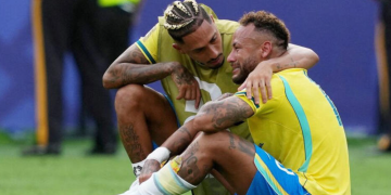 Brazil's Neymar is consoled by teammate Raphinha after Brazil's elimination from the FIFA World Cup 2026