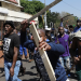 South Africans in Johannesburg carry sticks and traditional weapons during a protest amid the wave of xenophobic attacks targeting migrants, including Nigerians.