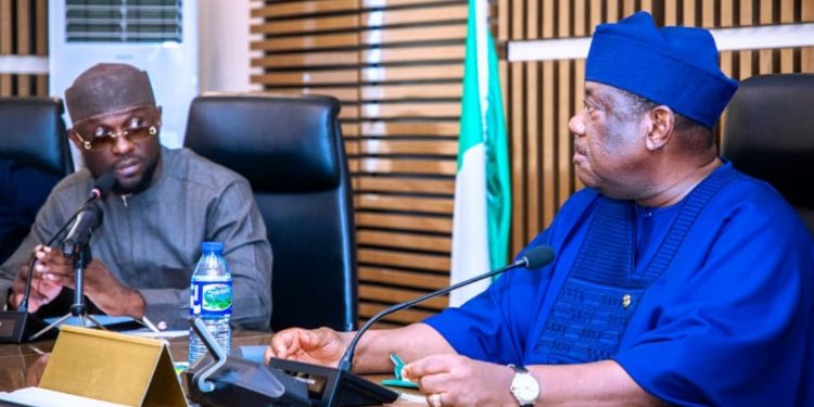 SGF, Senator George Akume with the DG, City Boy Movement Oluwatosin Shoga during a visit to his OSGF.