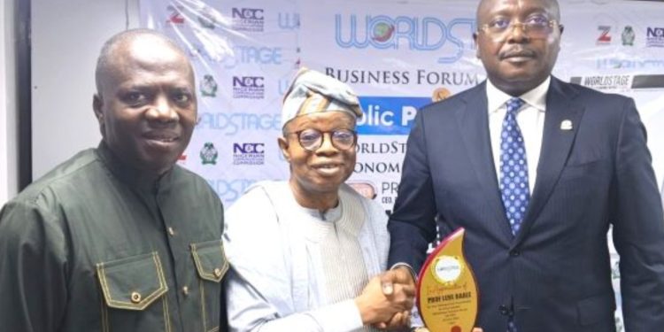Segun Adeleye, Prof. Lere Baale and Chief Emeka Obegolu at the WorldStage Business Forum in Lagos.