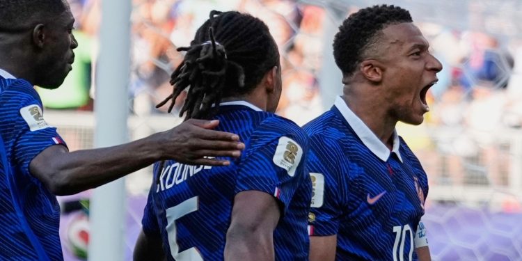 Kylian Mbappe celebrates penalty goal against Paraguay