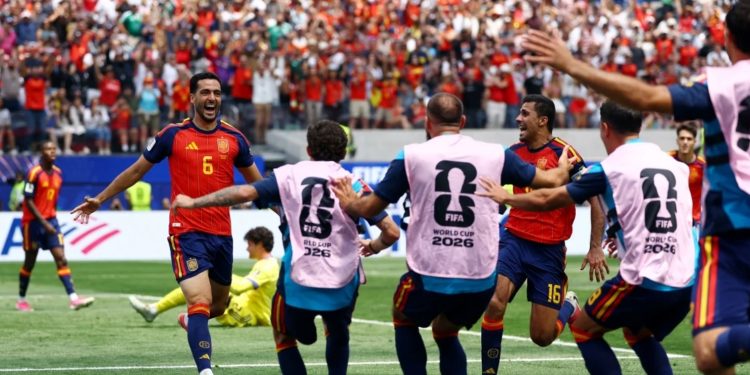 Mikel Merino jubilates after scoring winner against Belgium in Los Angeles.