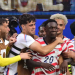 US forward #20 Folarin Balogun, C, celebrates scoring his team's third goal with teammates during the 2026 World Cup Group D football match between USA and Paraguay at the Los Angeles Stadium in Inglewood on June 12, 2026