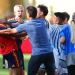 Eric Garcia of Spain clashes with Leandro Paredes of Argentina as coach Lionel Scaloni intervenes after the World Cup final