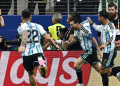 Argentina's forward #10 Lionel Messi celebrates with teammates after scoring his team's second goal during the 2026 World Cup Group J football match between Argentina and Austria at the Dallas Stadium in Arlington on June 22, 2026