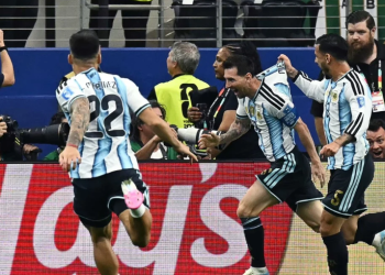 Argentina's forward #10 Lionel Messi celebrates with teammates after scoring his team's second goal during the 2026 World Cup Group J football match between Argentina and Austria at the Dallas Stadium in Arlington on June 22, 2026