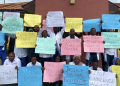 UITH doctors display placards over assault incident.