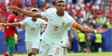Kylian Mbappe celebrates victory over Morocco