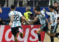 Argentina's forward #10 Lionel Messi celebrates with teammates after scoring his team's second goal during the 2026 World Cup Group J football match between Argentina and Austria at the Dallas Stadium in Arlington