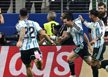 Argentina's forward #10 Lionel Messi celebrates with teammates after scoring his team's second goal during the 2026 World Cup Group J football match between Argentina and Austria at the Dallas Stadium in Arlington
