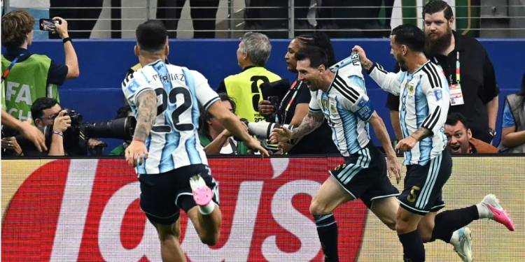 Argentina's forward #10 Lionel Messi celebrates with teammates after scoring his team's second goal during the 2026 World Cup Group J football match between Argentina and Austria at the Dallas Stadium in Arlington