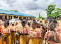 Secondary school students receive copies of Animal Farm under the Million Classics Programme
