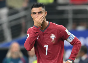 Portugal's forward #07 Cristiano Ronaldo reacts after losing the 2026 World Cup round of 16 football match between Portugal and Spain at the Dallas Stadium in Arlington on July 6, 2026